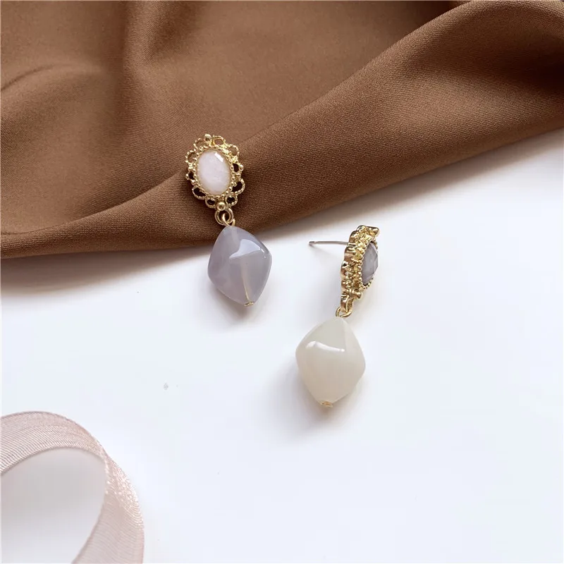 S925 Серебряные иглы Асимметричные личности полые серьги в виде цветка изысканный