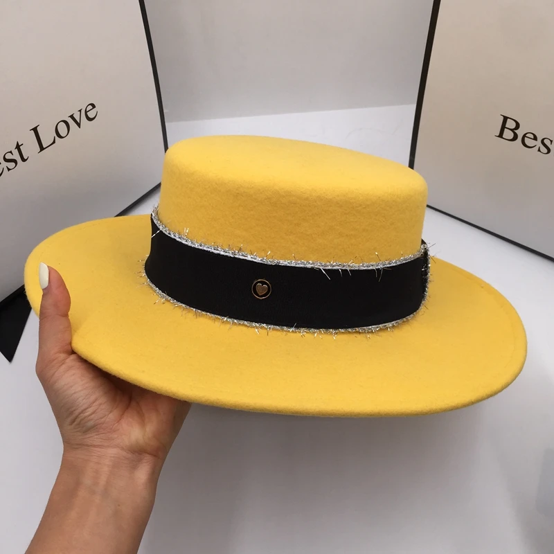 

In the spring and autumn winter new wool yellow hat for women felt fedora style of British large French eaves