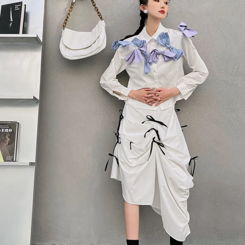 

LANMREM Bow Tie Asymmetrical Irregular Skirt Female Half-length White High-waist Pleated All-match Skirts Women Fashion 2D1220