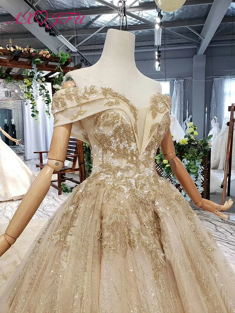 AXJFU Luxury princess golden flower lace boat neck beading crystal sparkly star bride tail wedding dress real photo 11669