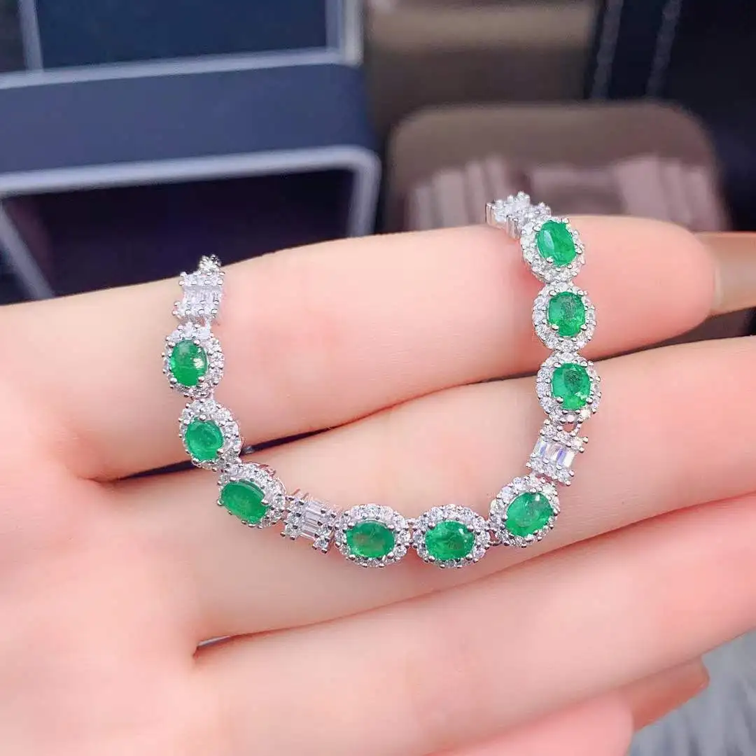 

Женский браслет из серебра 100% пробы с изумрудами