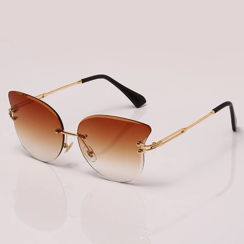 

Luxury Fashion Sexy Cat Eye Sunglasses Women Rimless Wave Butterfly Sun Glasses Metal Shades for Vintage Women Eyewear UV400