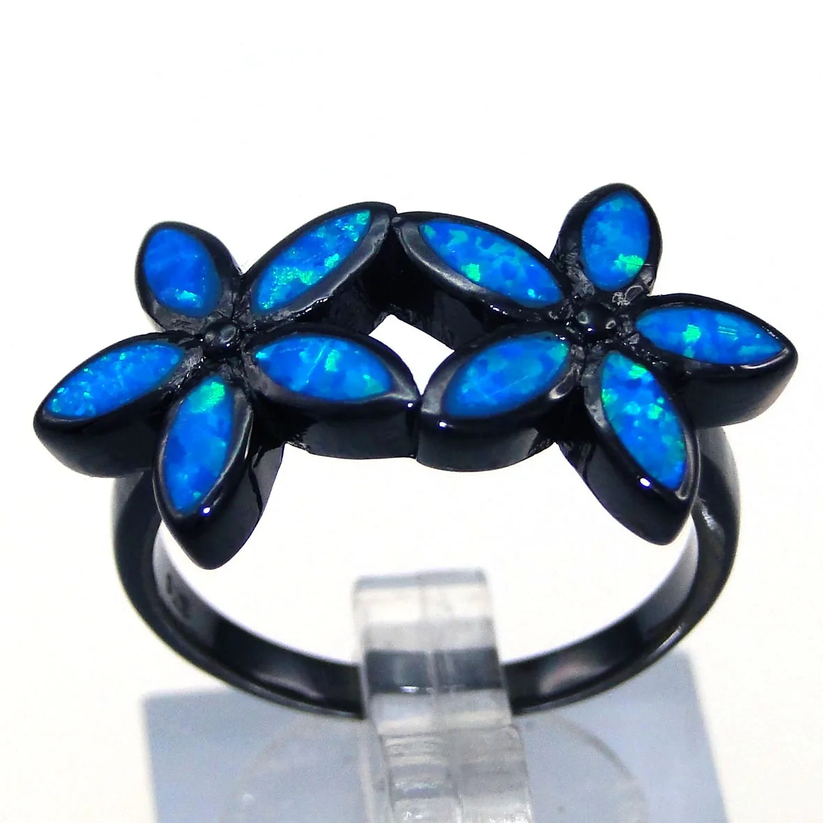 

Black Rhodium Plated Blue Opal Ring Flower