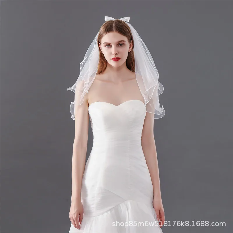 Белый бант двухслойная маленькая вуаль с боковым гребнем для волос фото тиара