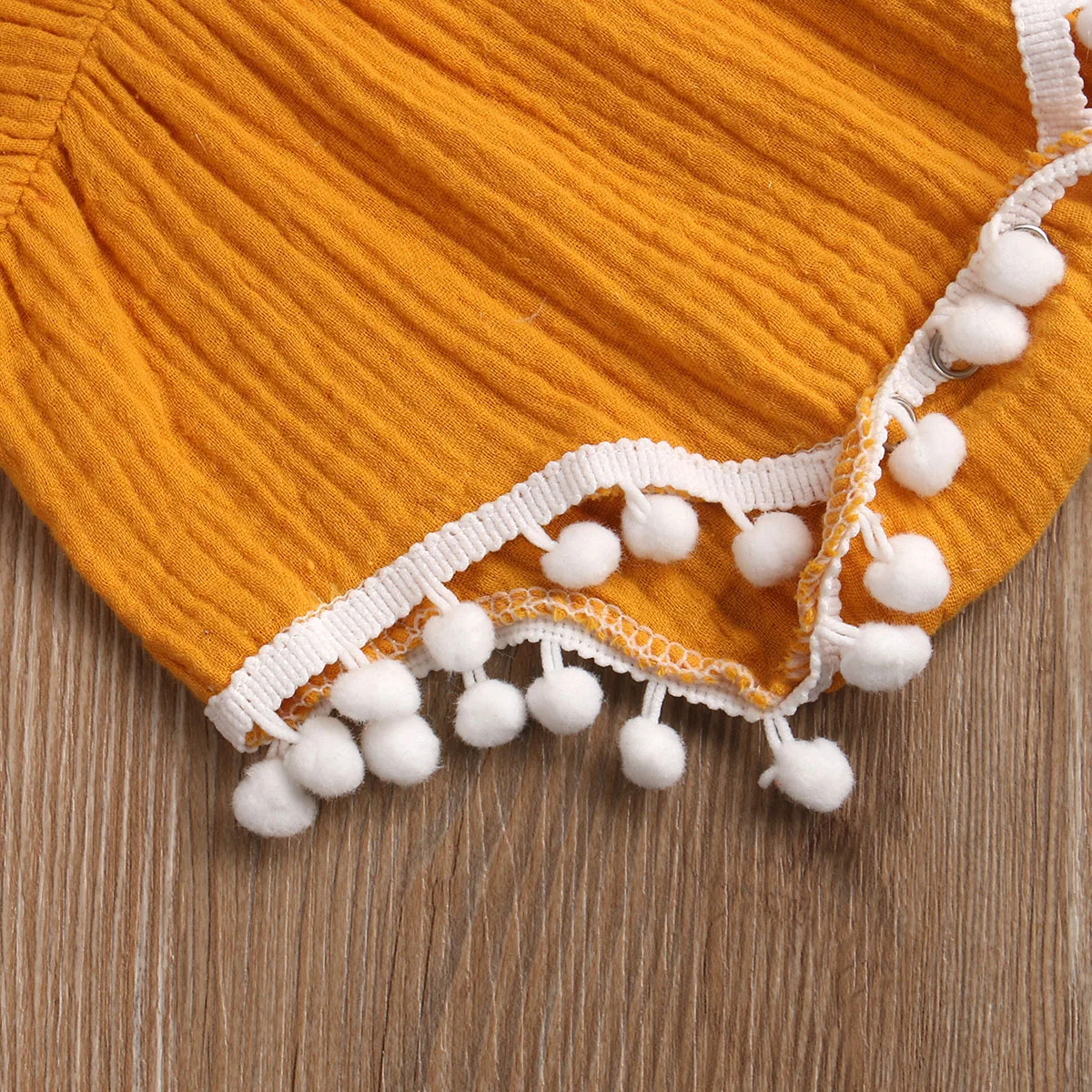 

New Summer Infant Sweet Style Plush Ball Decoration Sleeveless Suspender Jumpsuit Clothing for Travel Vacation