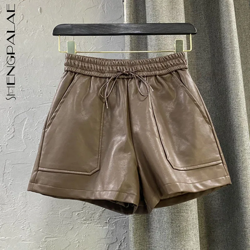 

SHENGPALAE Fashion Drawstring Shorts Women's Autumn 2021 New High Waist Wide Leg Loose Streetwear PU Leather Short Pants Female