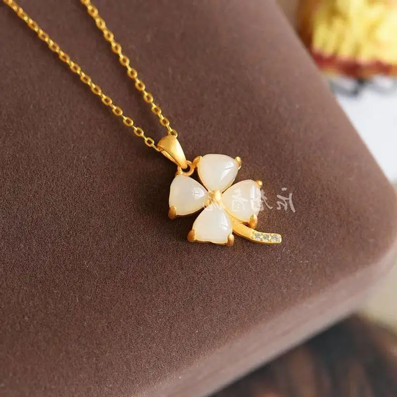 

Natural Hetian White Jade Jasper Four-Leaf Clover Pendant 925 Sterling Silver Ancient Style Thick Gold Inlaid Ice Bottom Spinach