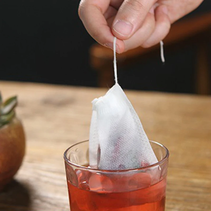 

Tea Bags 100 Pcs/Lot Empty Spice Drawstring Pouch Bag 7*9cm/ 8*10cm/10*12cm/10*15cm Seal Filter Herb Coffee Pouches Tools