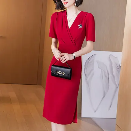 

HAN Dress female V-neck solid color summer new style was thin high waist puff sleeve bag hip split skirt