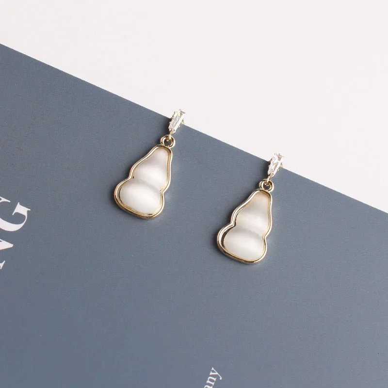 

CHENFAN S925Japanese and Korean style simple and fresh opal earrings clothing accessories jewelry shell metal earrings for women