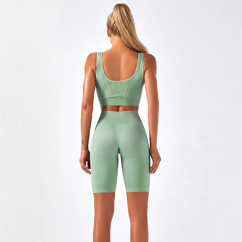 Женский спортивный комплект TWOTWINSTYLE эластичный Быстросохнущий из жилета с