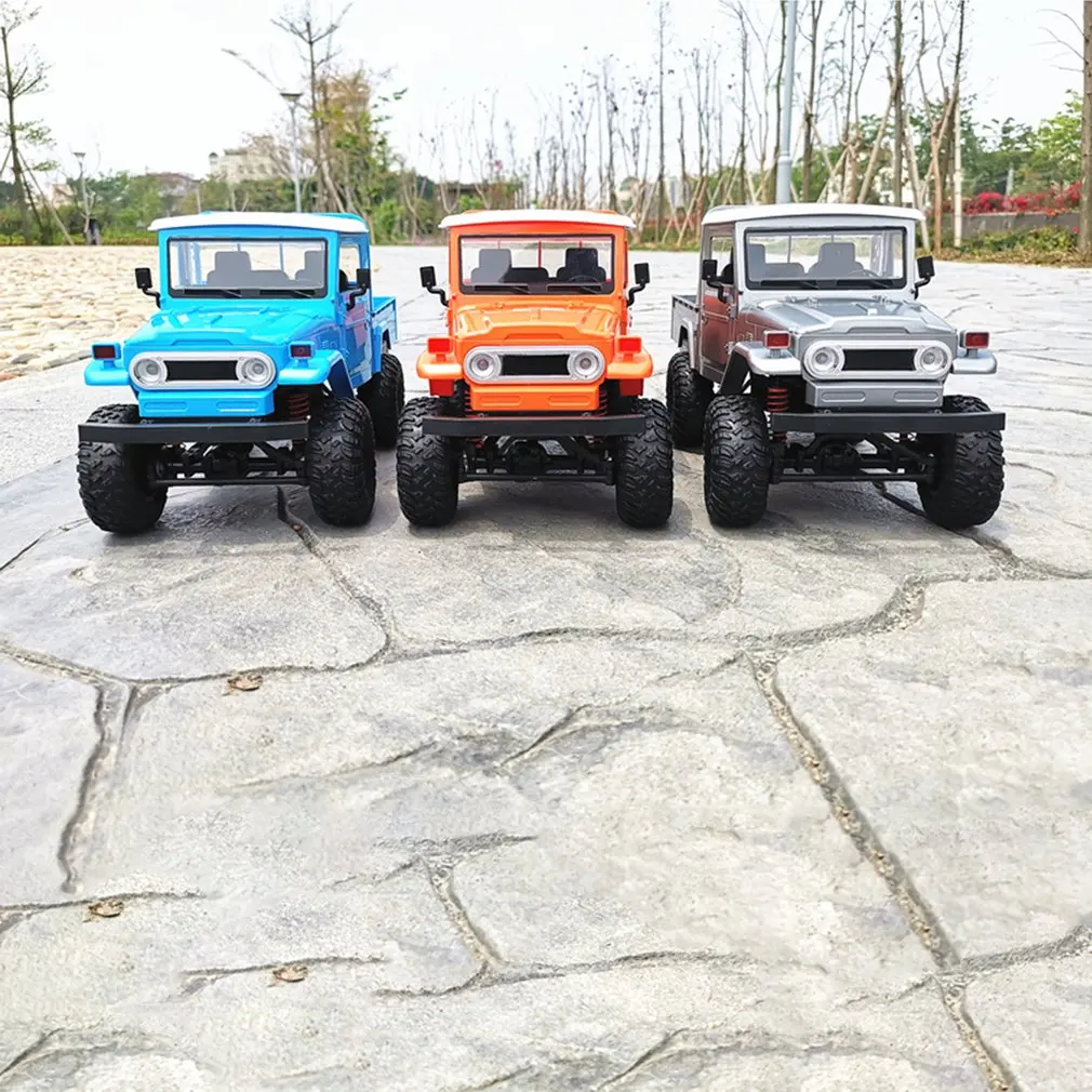 

MN45 2.4G RC Car Crawler Off-road Car Buggy Moving Machine WPL MN RC Car 4WD Crawler Climbing Off-Road Truck FJ45 for Kids Gifts