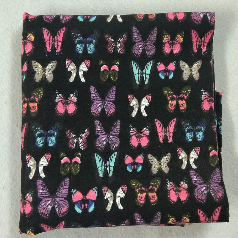 Довольно толстый черный красочными бабочками и бантиками с напечатаным холстом