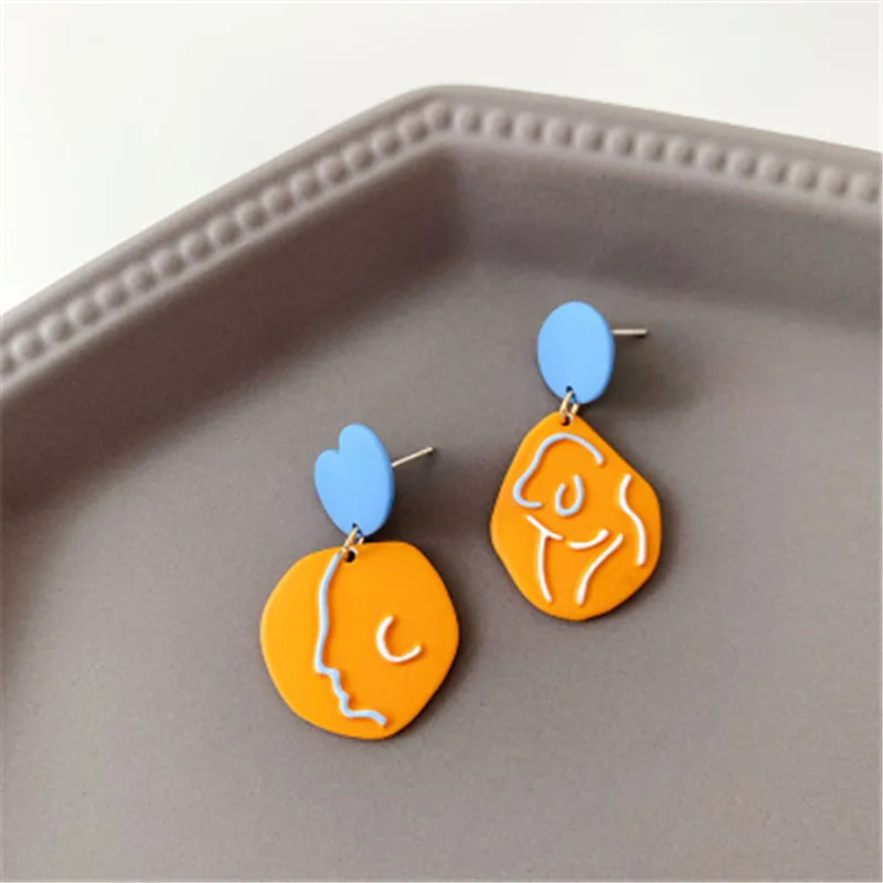 

Han Guodong door earrings female asymmetric contrast color abstract lines earring stud earrings contracted temperament joker col