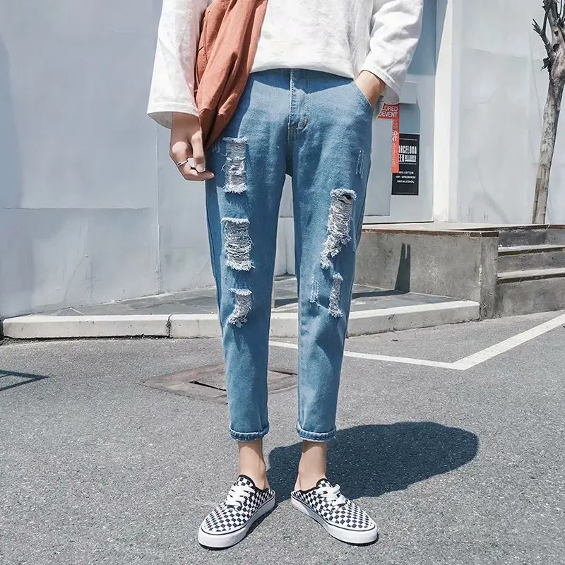 

Men's jeans with holes in the summer new cropped trousers trend casual loose feet Joker pants Korean beggar pants