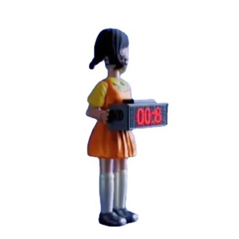 El nuevo reloj despertador con juego de calamar gira y lanza el reloj de mesa-4