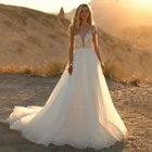 ТРАПЕЦИЕВИДНОЕ свадебное платье с V-образным вырезом и аппликацией