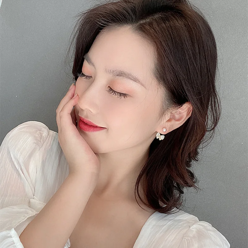 

2021 Korean Fashion Sweet Girl EarringsNew Temperament Earrings Wild Personality Small Bow Pearl Crystal Earrings Women