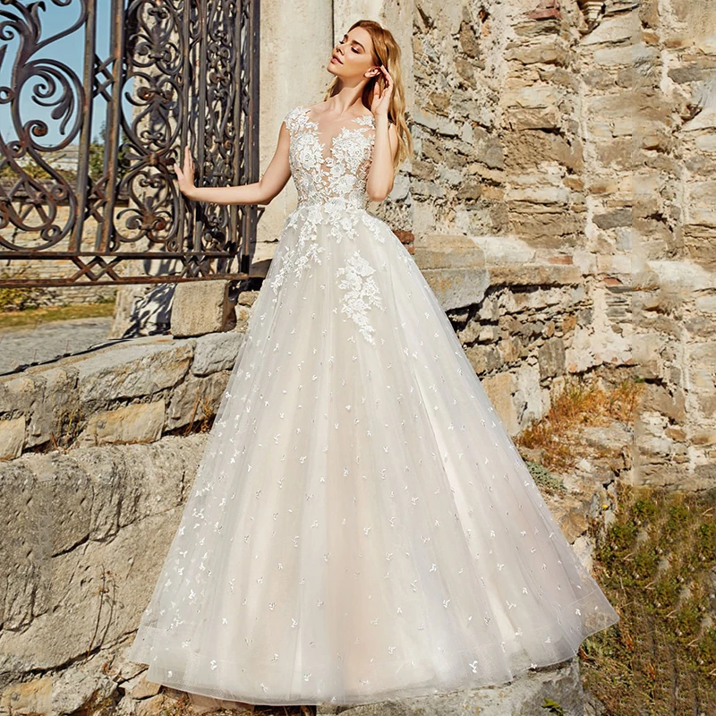 

Charming Scoop Neck A-line Tulle Bridal Dress 2021 High Quality Appliques Sweep Train Sleeveless Backless Wedding Gowns