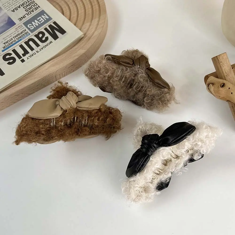 

Autumn Winter Korean Leather Hair Claw Bow Elegant Temperament Grasping Headwear Simple and Light Luxury Tide Shark Clip