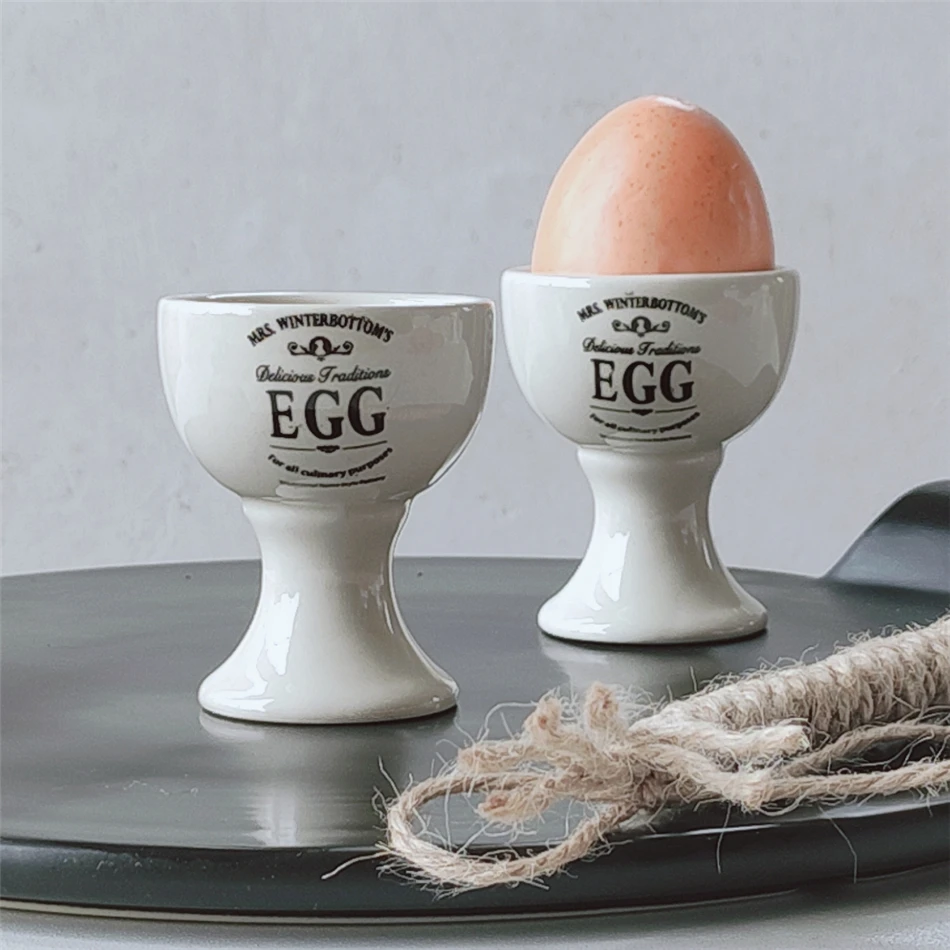 

Nordic Style Ceramic Egg Tray Creative Egg Cup Holder Stander Home Decoration Breakfast Egg Cup Kitchen Table Utensils 2PCSZA322
