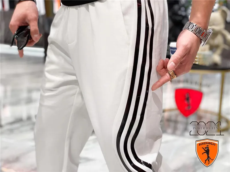 

The new European summer 2021 men's South Korean slim-fit handsome web celebrity youth stripe stretch tracksuit pants