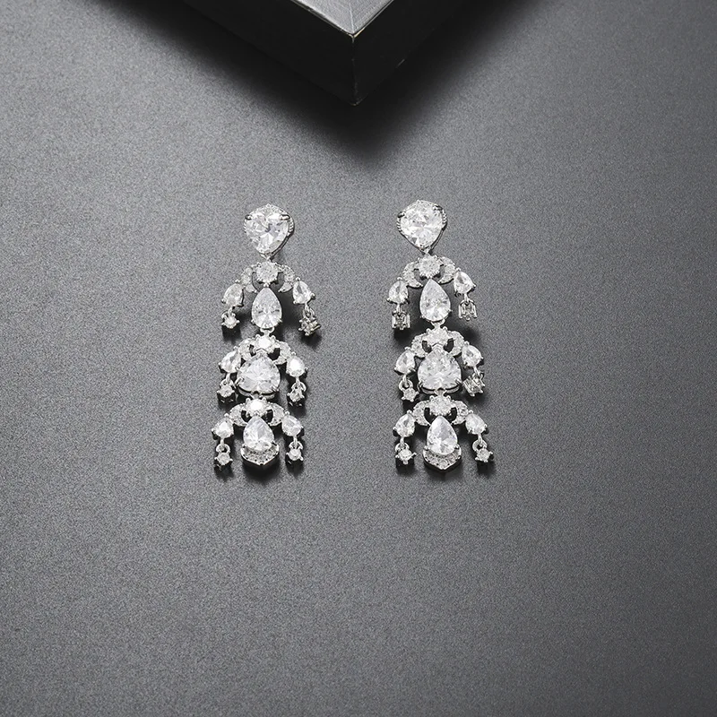 

Baroque jewelry European and American fashion net red same earrings female drop-shaped tassel earrings pomegranate red earrings