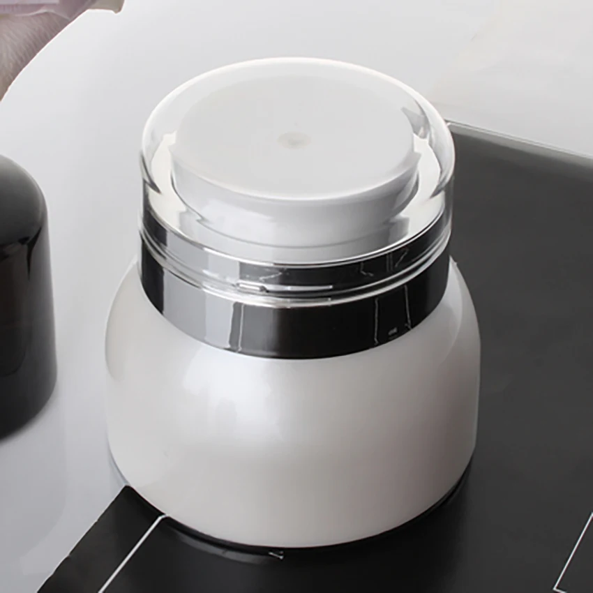 

30g/50g Vacuum Refillable Bottles Travel Cosmetic Empty Bottle Reusable Dispenser Bottle for Face Cream Press Style Box