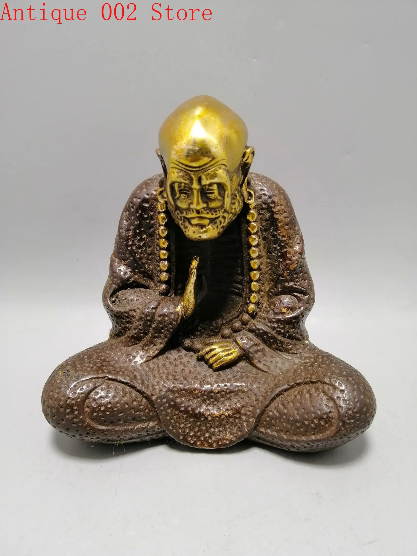 

Искусство позолота буддистской Дармы в античной латунной коллекции