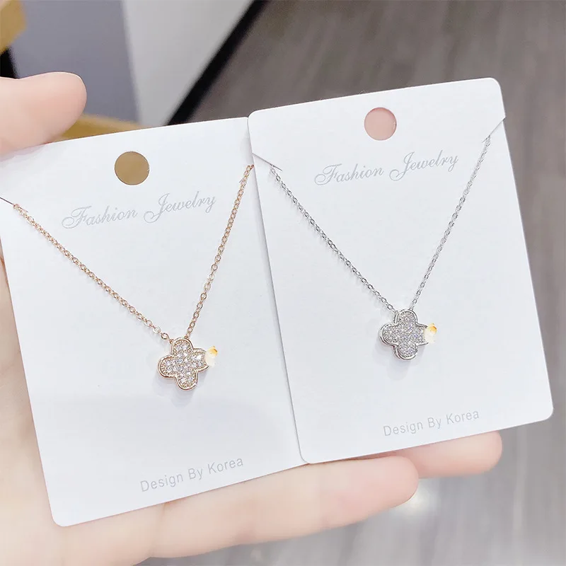 Новое ожерелье с кулоном в виде четырехлистника из меди и циркона позолоченная