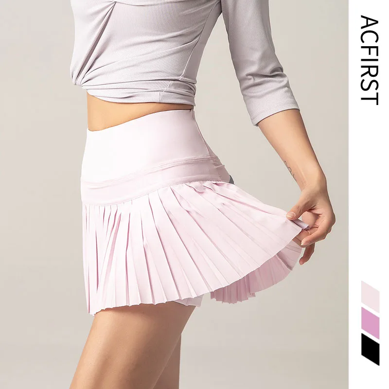 

AcFirst женские спортивные шорты с двумя боковыми карманами, дышащие быстросохнущие летние шорты для фитнеса, спортивные юбки