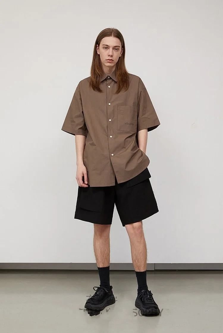 Черные мужские свободные брюки с большими карманами и асимметричными шортами -