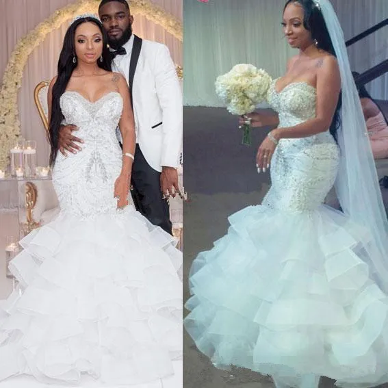 

2019 Sexy Mermaid Wedding Dresses Sweetheart Crystal Pearls Beaded Embroidery Ruffled Layered Nigerian Bridal Wedding Gowns