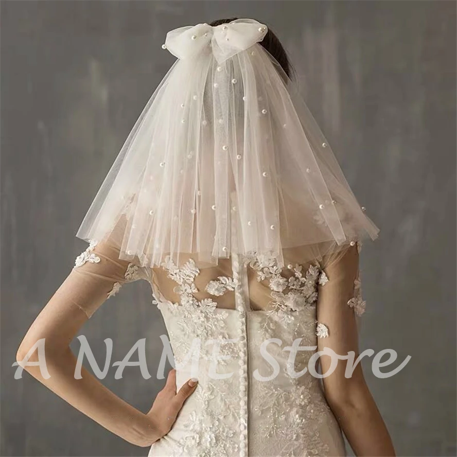 

ISHSY Short Cute Bridal Wedding Veils Two Layers with Comb Bows Pearls Tulle Veil mini for Brides Voile de Mariage Velo de novia