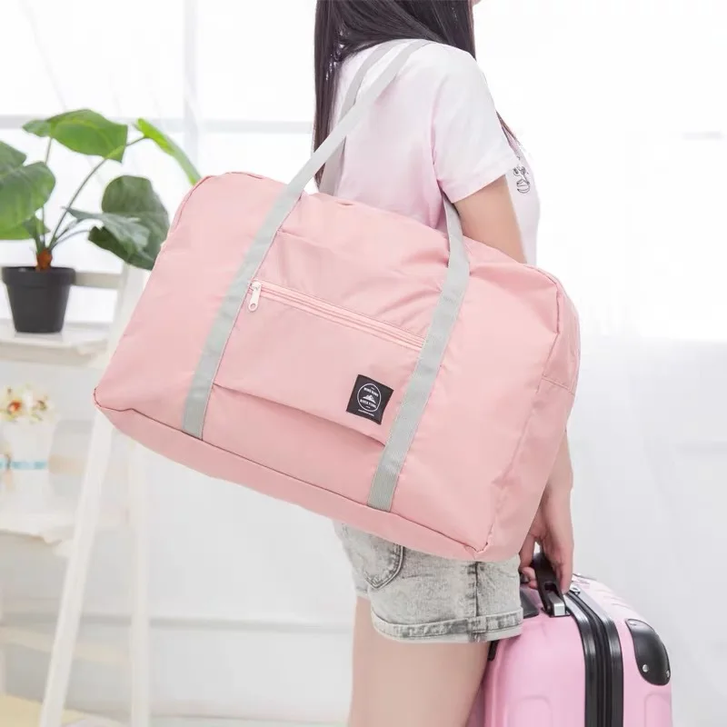 

Nordic travel folding storage bag thick waterproof Oxford cloth airplane bag solid color finishing storage square handbag