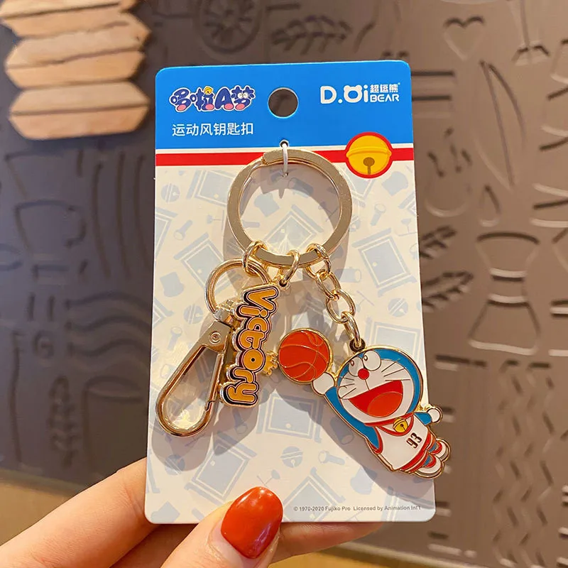 

In Vogue Doraemon Metal Car Lovers Key Chain Cute Cartoon Jingle Cat Keychains 2021 New Bag Pendant Men Women Keyrings Wholesal