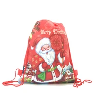 6122430pcs cartoon drawstring bag christmas gift bags for kids happy new year candy bags childs school backpack travel bags