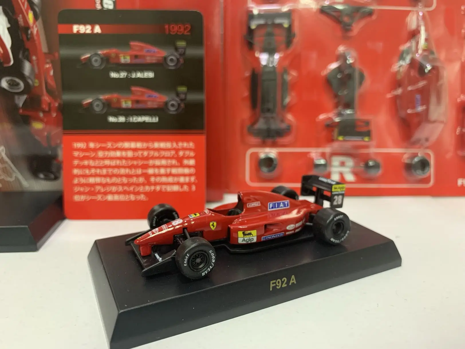 

1/64 KYOSHO Ferrari F92A Alesi No. 27 1992 FORMULA One F1 RACING Collect die casting alloy assembled trolley model