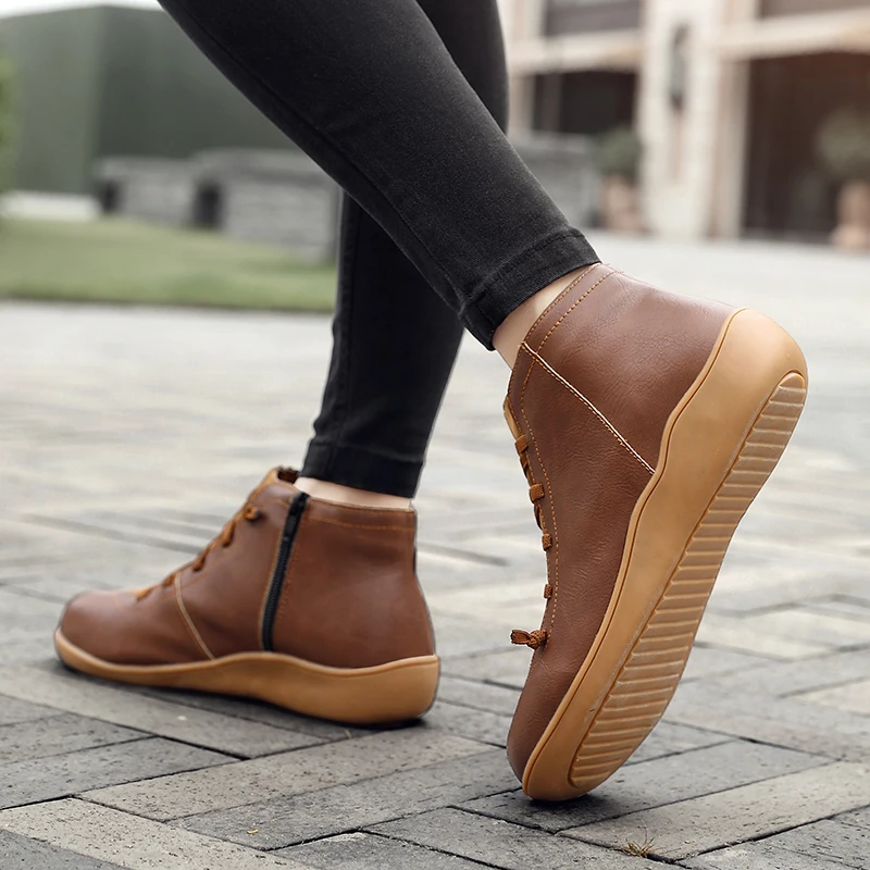 

Women Arch Support Ankle Boots Casual Cross Strappy Side Zipper Winter Short Leather Boots Vintage Punk Flat Shoes Lady 2020 New