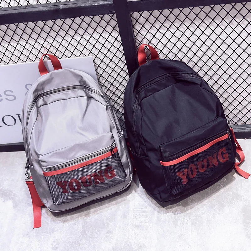

Korean version of simple letter pendant canvas backpack casual couple style