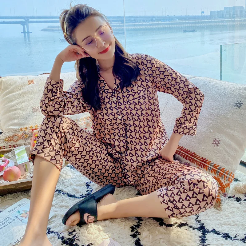 

2021 new ice silk pajamas women's lapel buckle thin long-sleeved trousers women's home service two piece set summer sleepwear