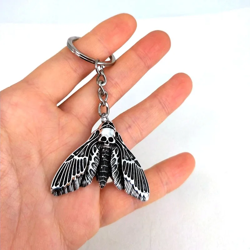 

1 шт. Цвет: старое серебро Мертвая голова череп моли брелки для женщин рождественские брелок в подарок