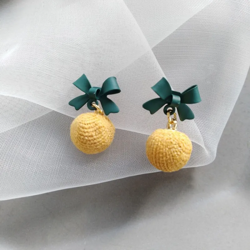 

Sweet girl bow earrings with creative color contrast personality string ball earrings