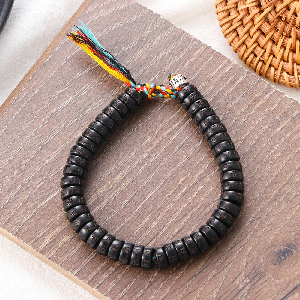 Браслет мужской плетеный из хлопковой нити с бусинами кокосовой ракушки |