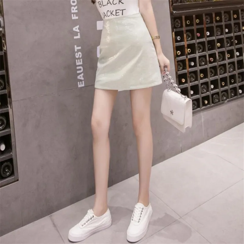 Юбка женская короткая трапециевидная из экокожи с высокой талией и блестками |