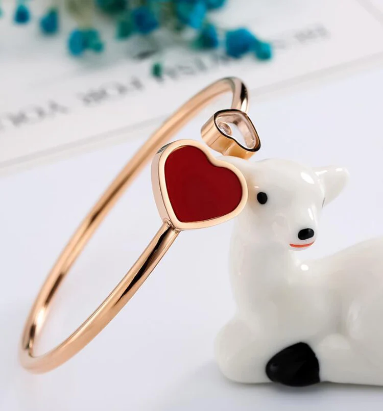 Браслет-манжета женский из нержавеющей стали под розовое золото с фианитами |