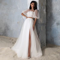scoop short sleeve wedding dresses floor length side slit bridal gowns with puff tulle applique button back court train 2022