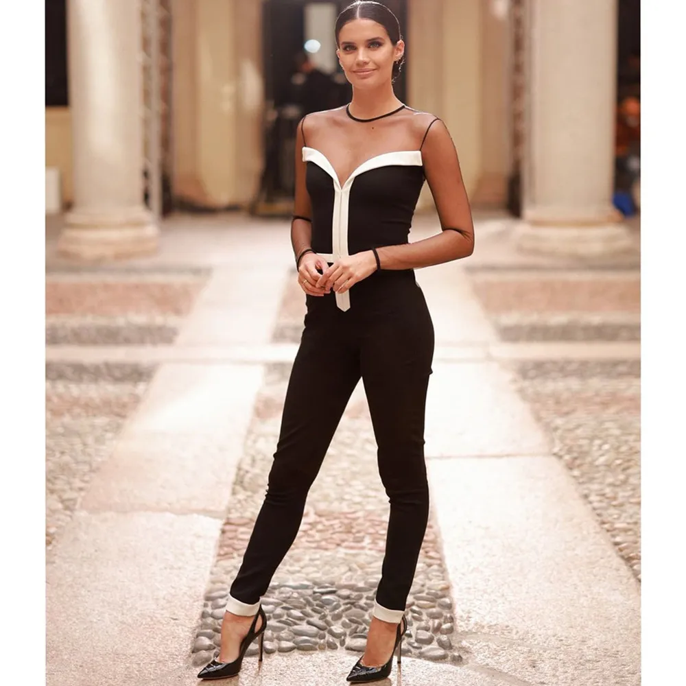 Женский комбинезон с длинным рукавом черный облегающий в стиле пэчворк зима 2022 |