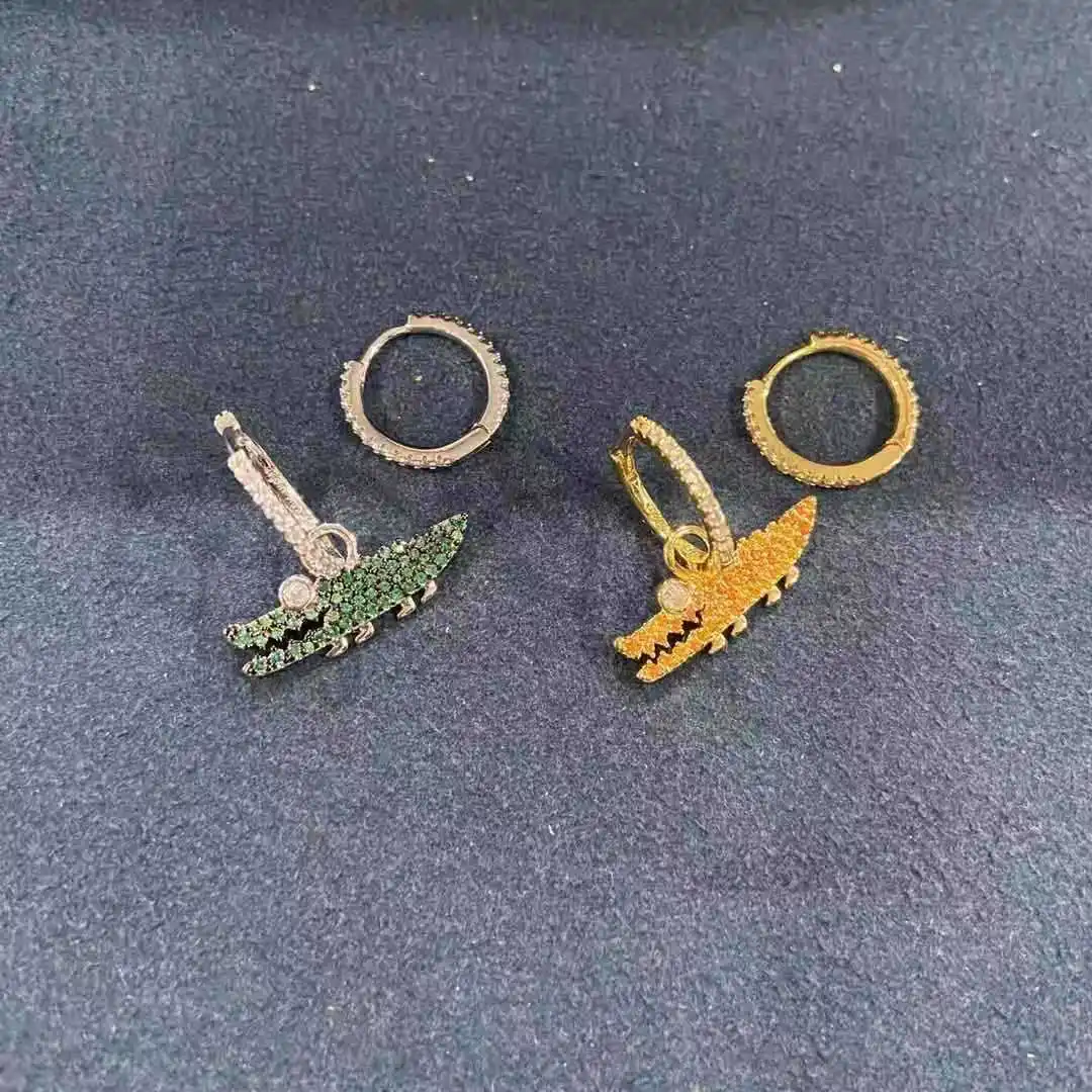 

Женские серьги из серебра 925 пробы с зеленым оранжевым крокодилом