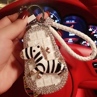 car key protective cover key case diamond car key cover male and female key case key chain pendant hair ball key case carteiras